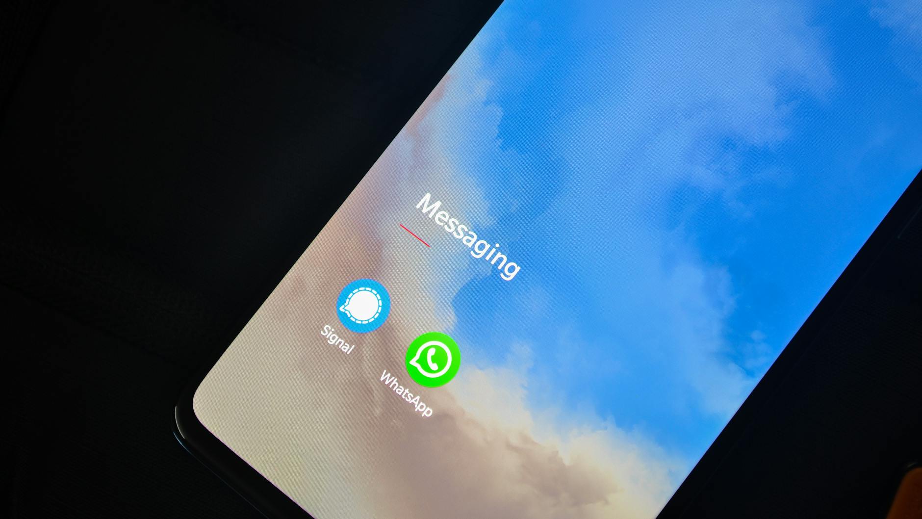 hand holding android phone displaying 5G signal