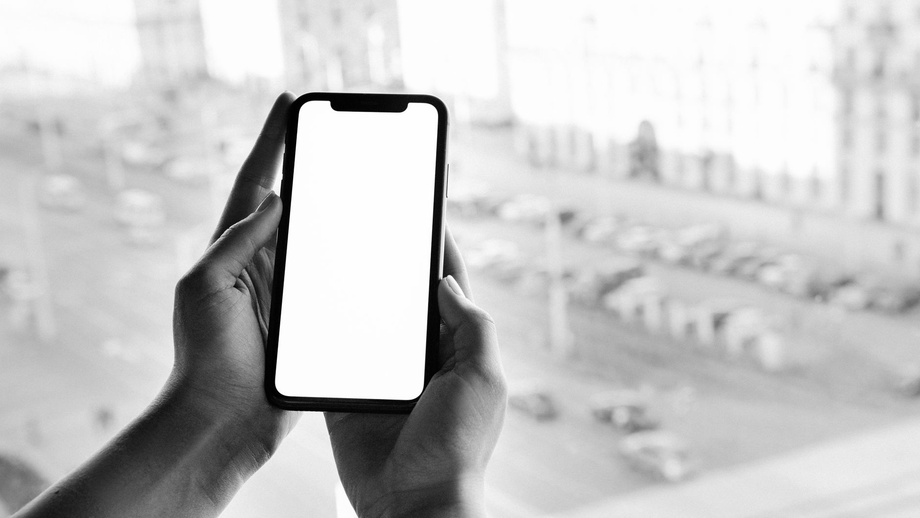 hands holding smartphone 5G network display