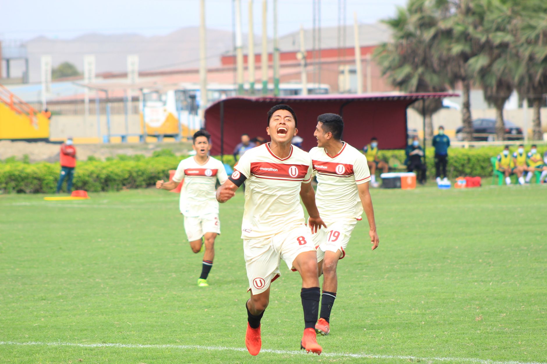 Indonesian football player celebrating on field