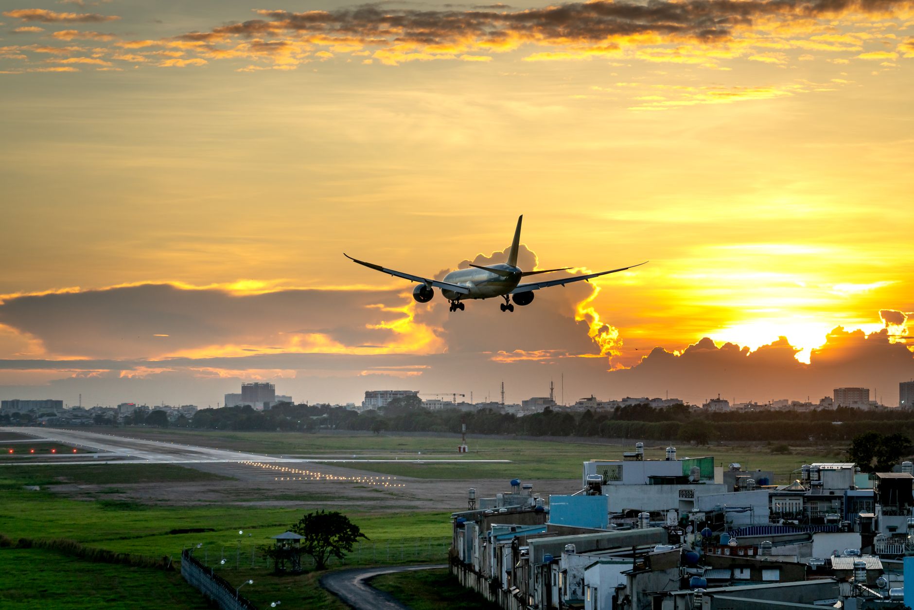 Airplane taking off from airport runway