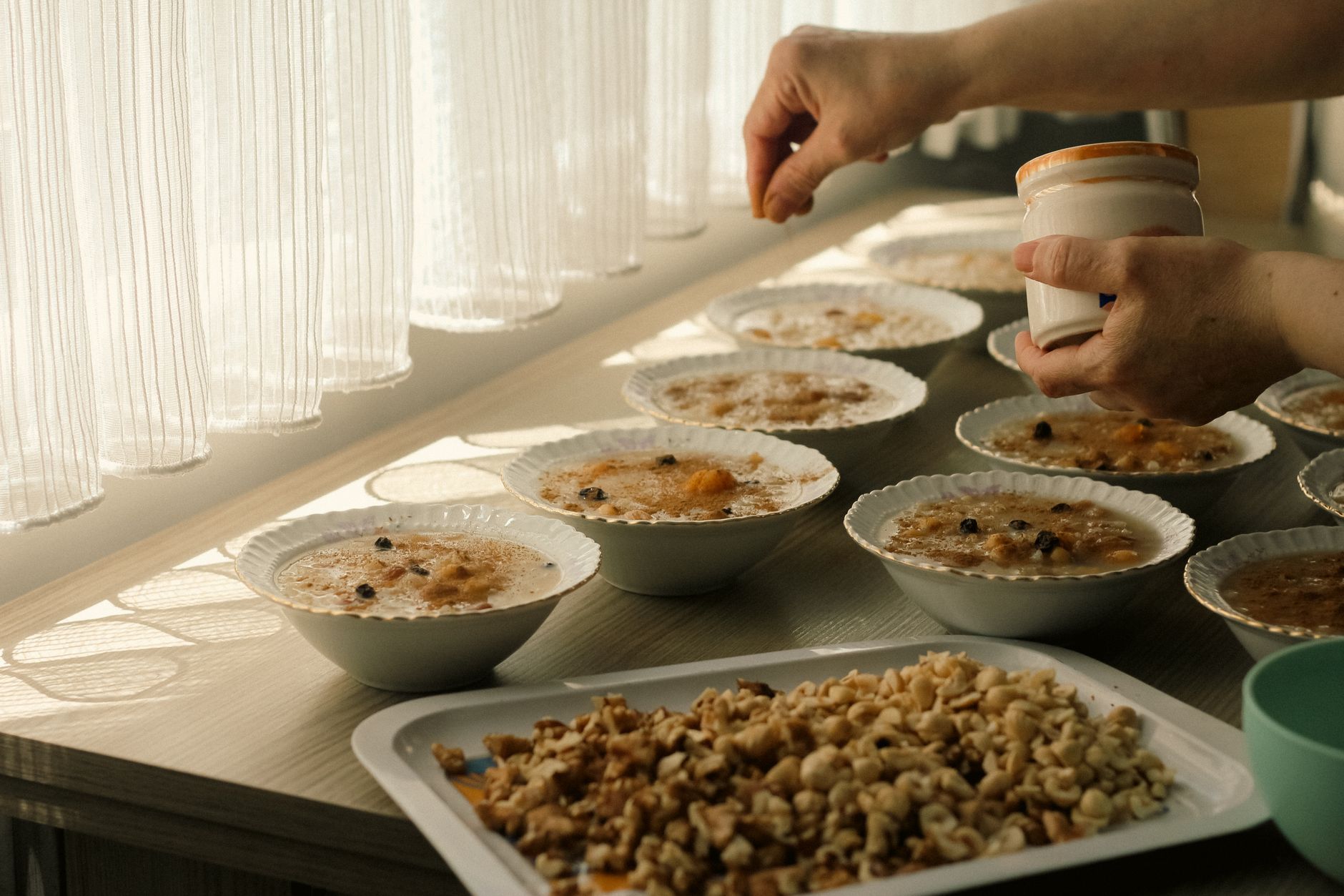 woman preparing colorful healthy meal bowl kitchen