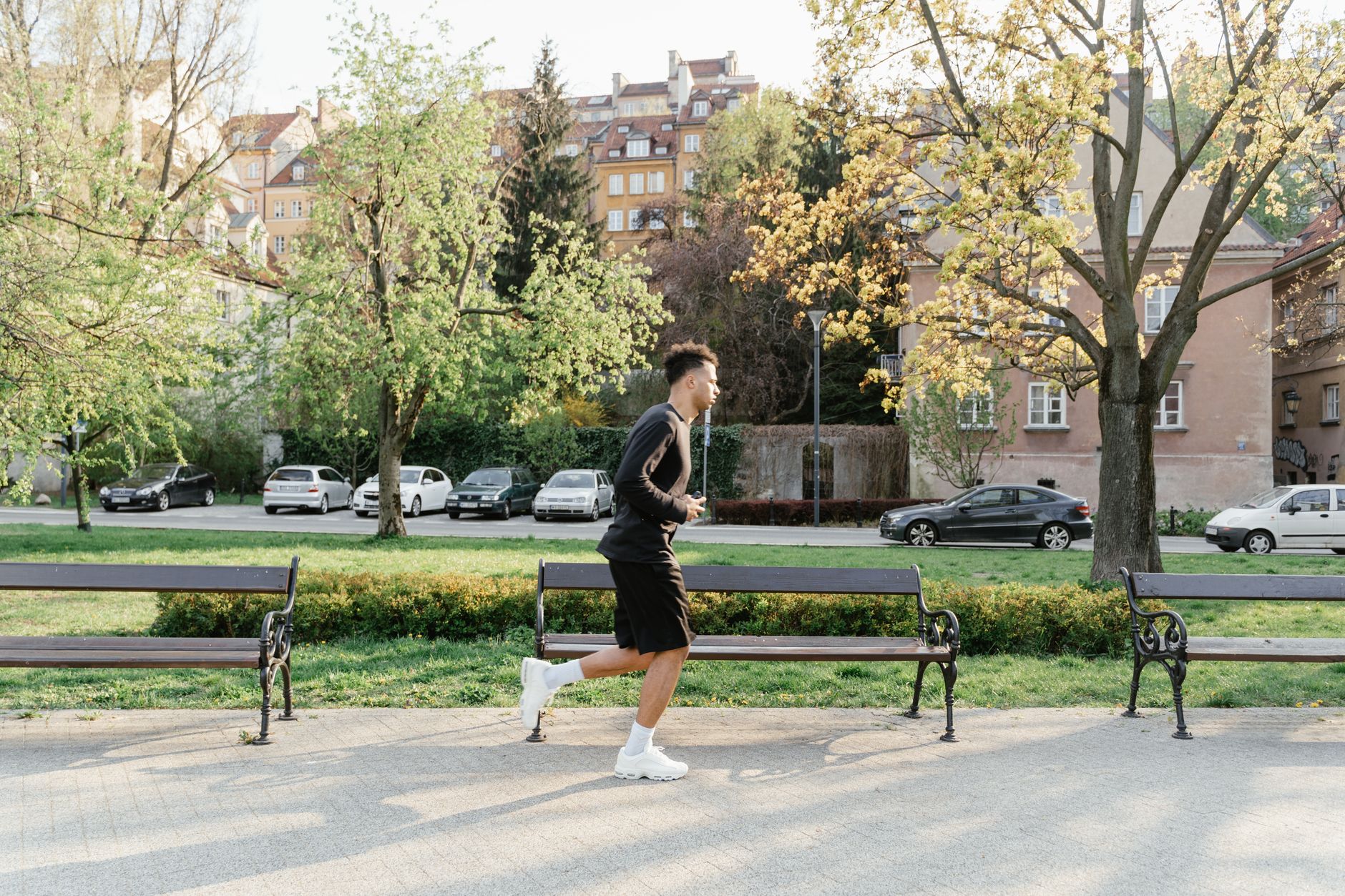 runner checking smartwatch after morning jog