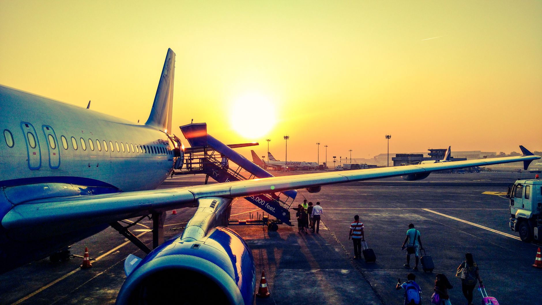 travel fair visitors looking at airline offers