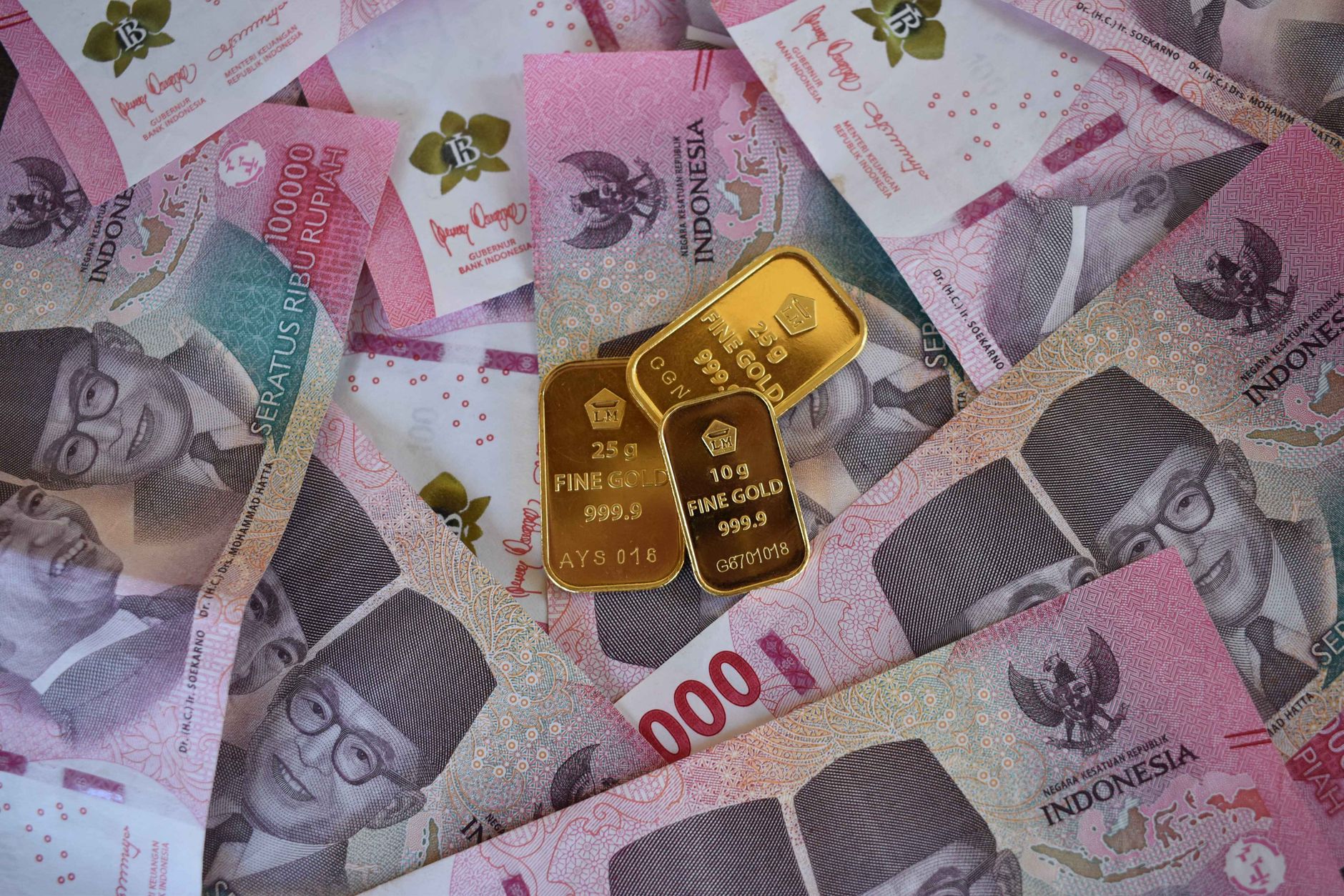 rupiah banknotes spread on office desk