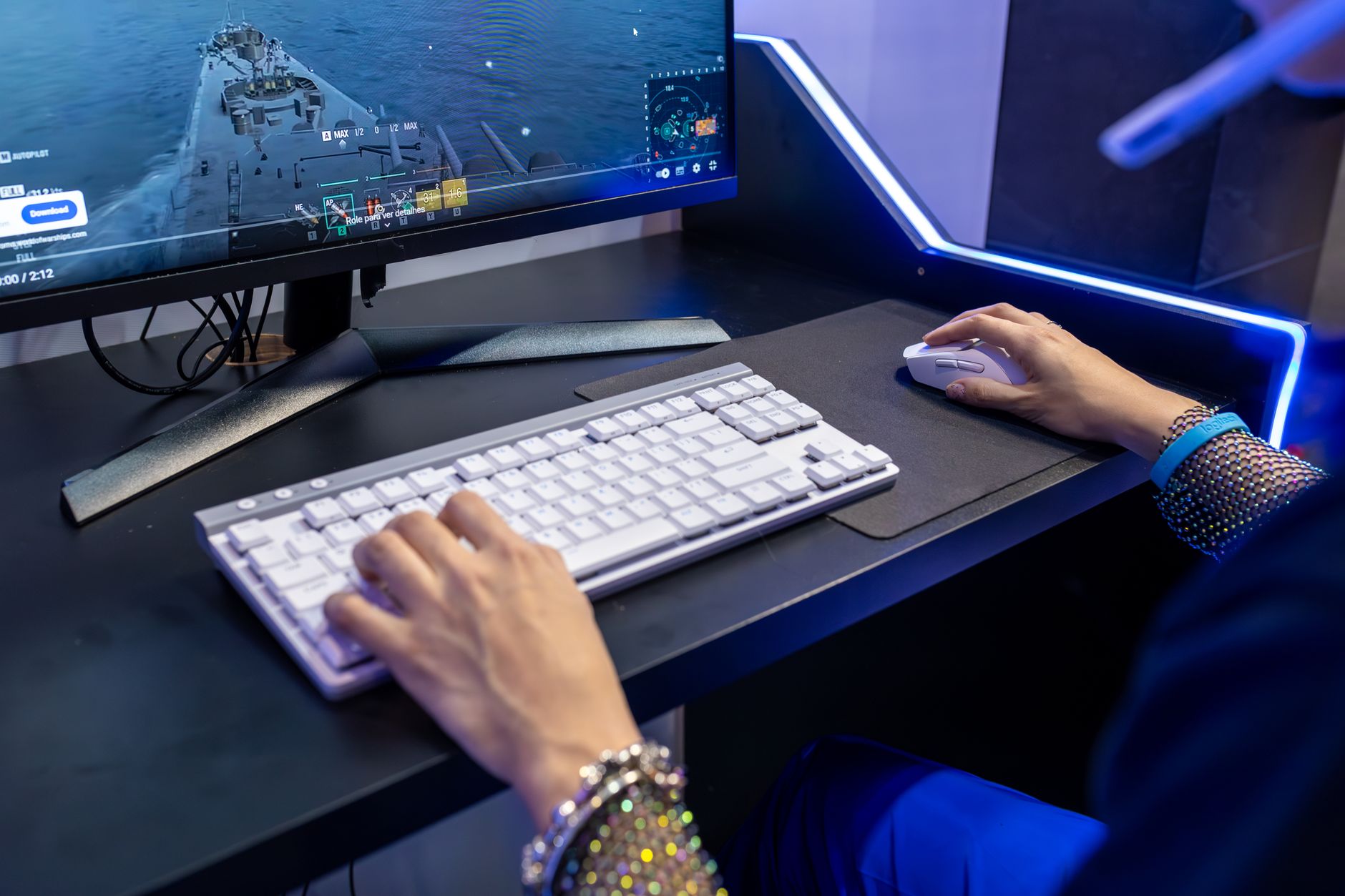 gamer hands on RGB keyboard playing efootball