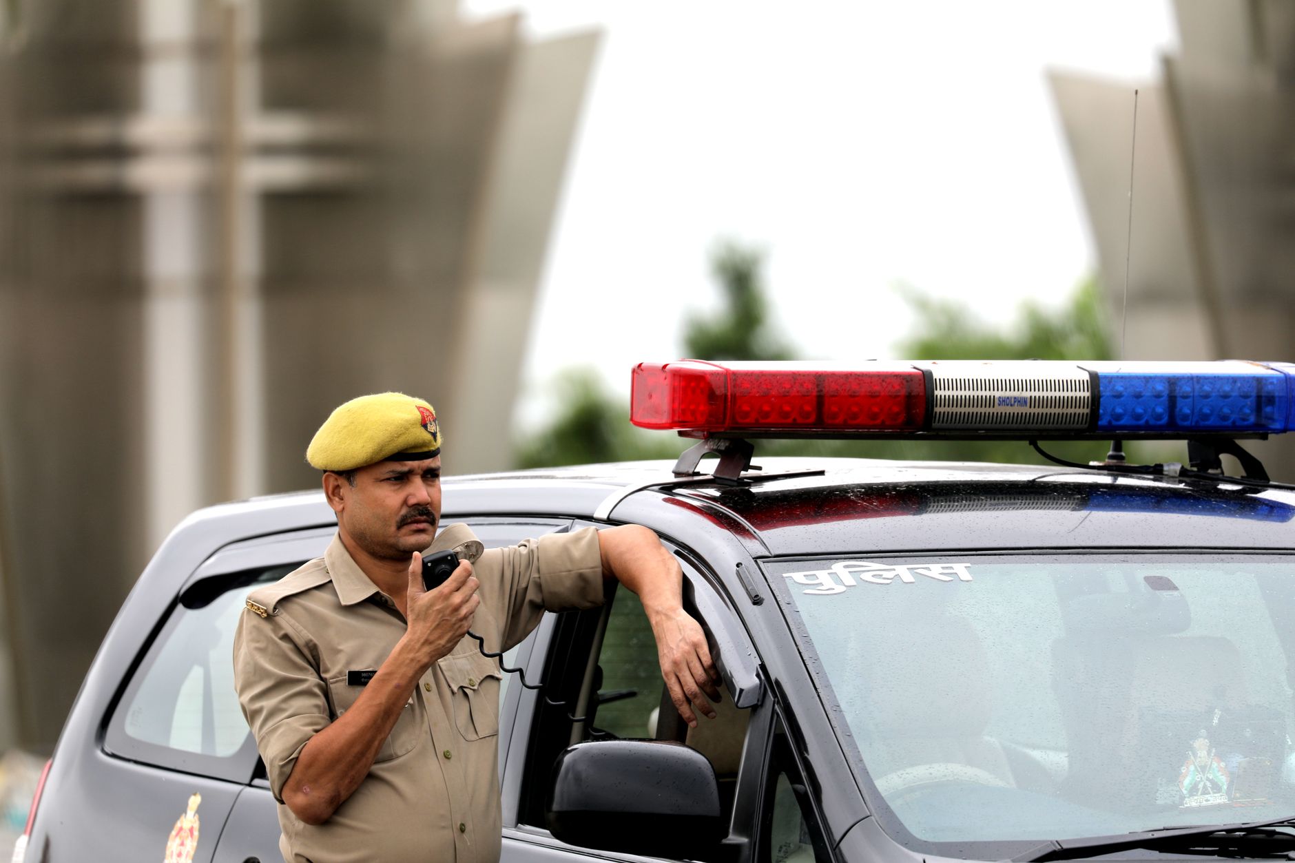 police officer saluting in official uniform