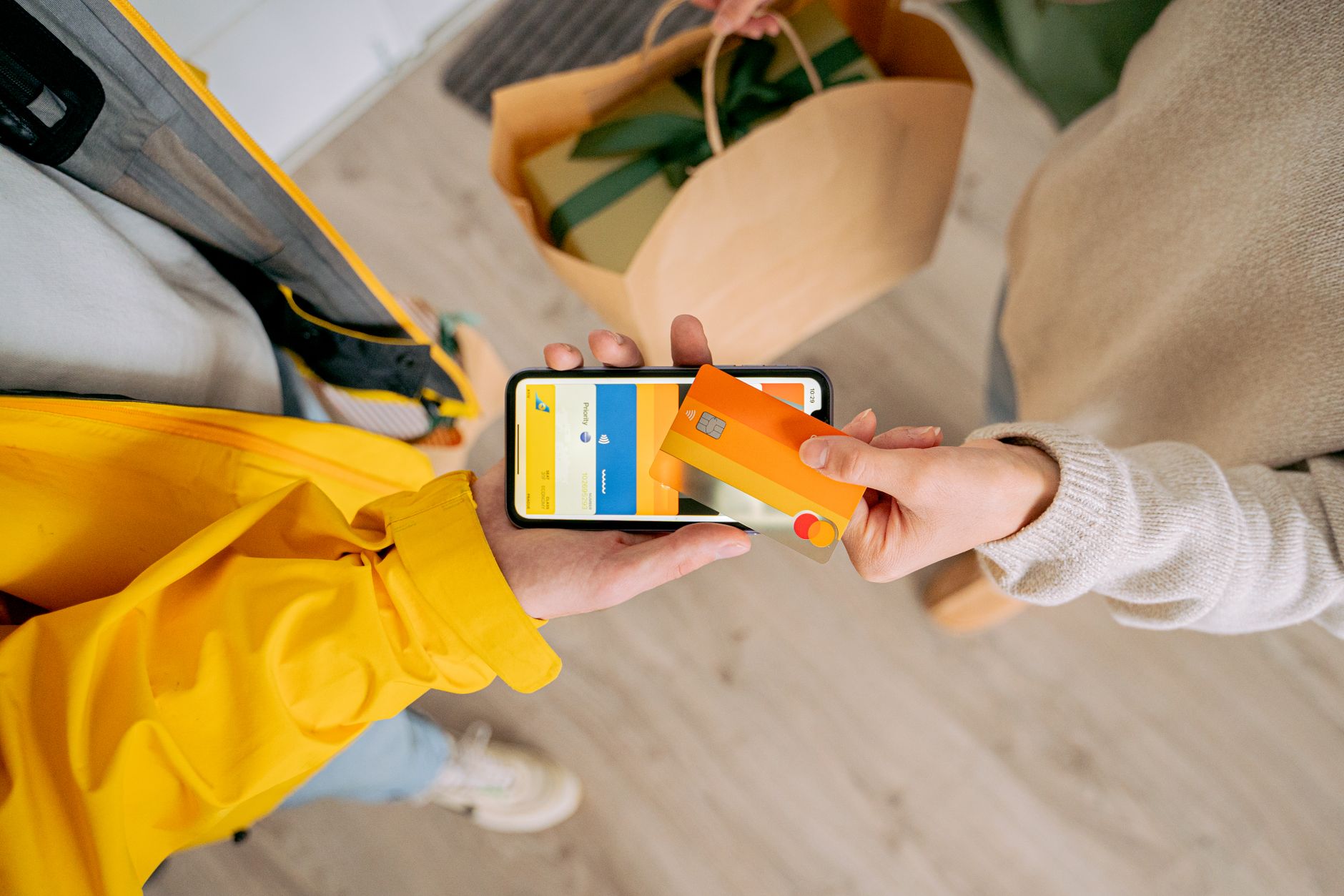 hand holding smartphone paying electricity bill online