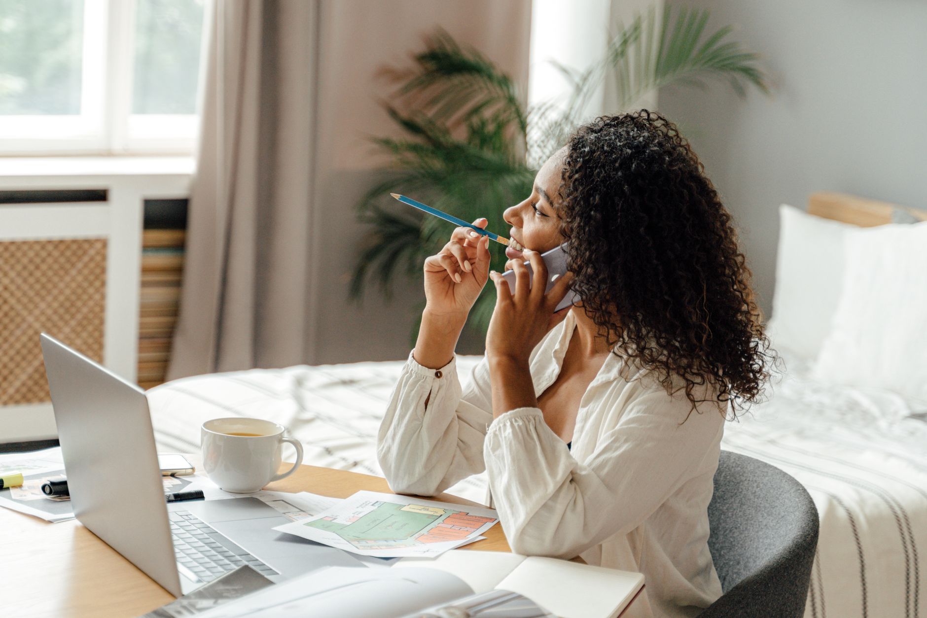 Woman working remotely from home office