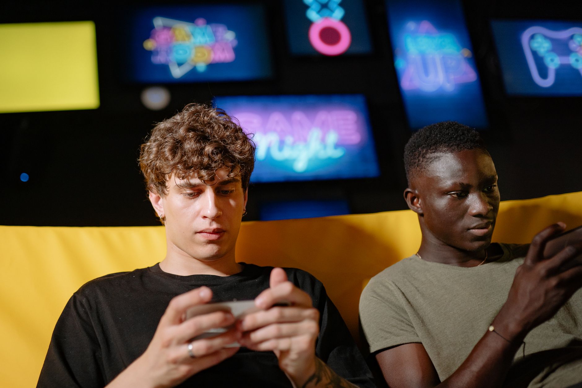 gamer hands holding smartphone playing mobile game