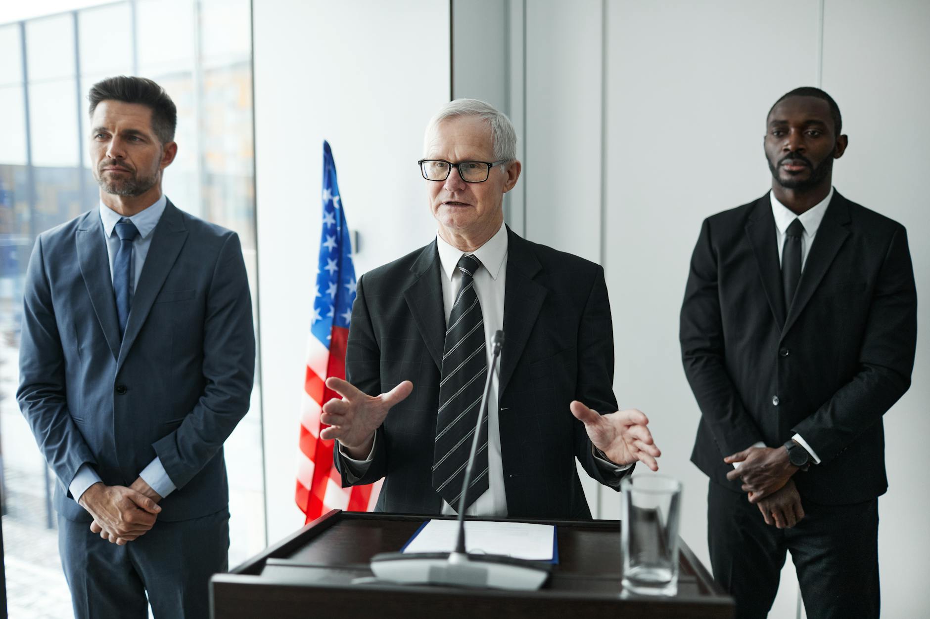 government official announcing policy change at press conference