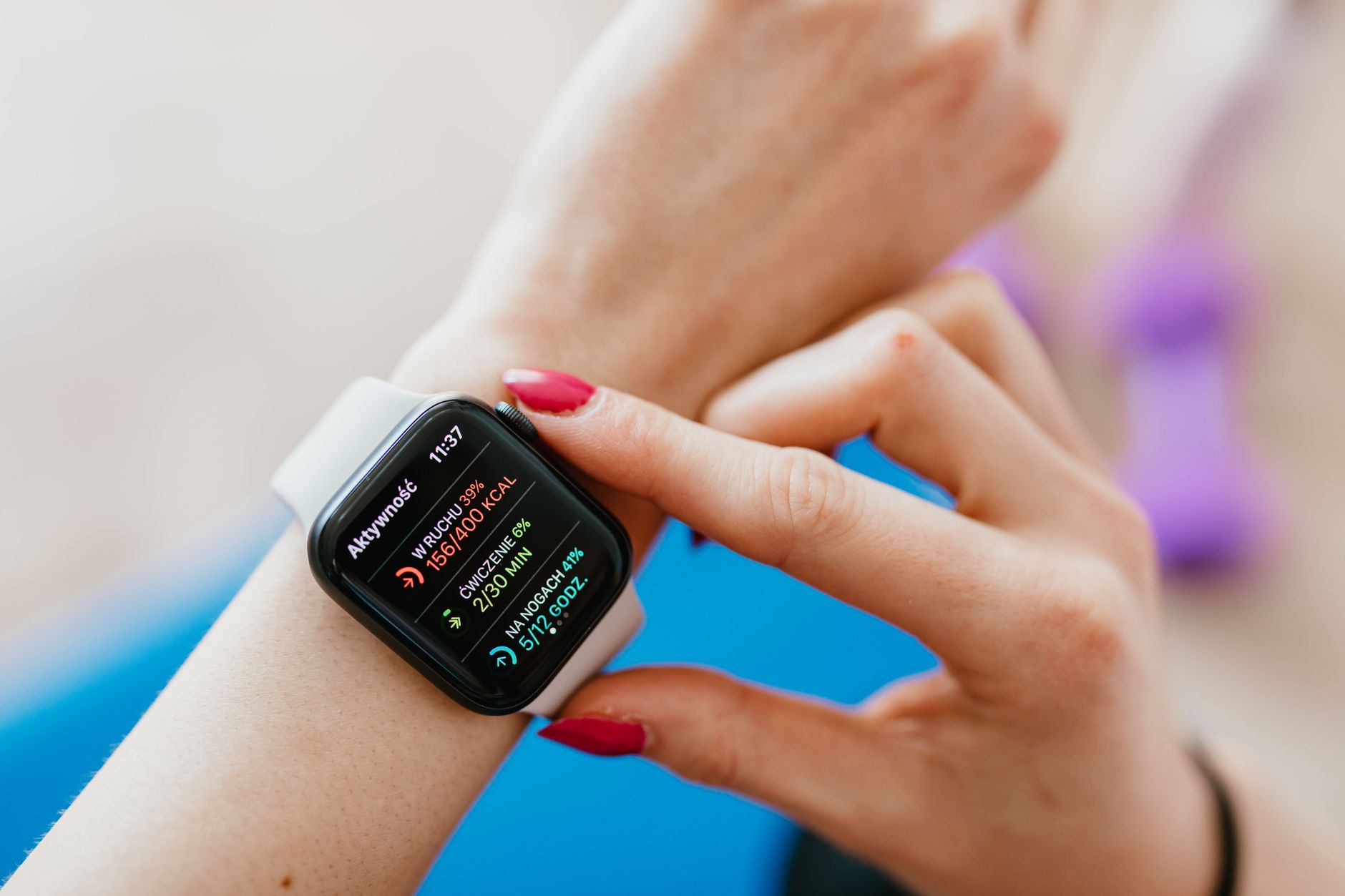 close-up smartwatch display showing heart rate